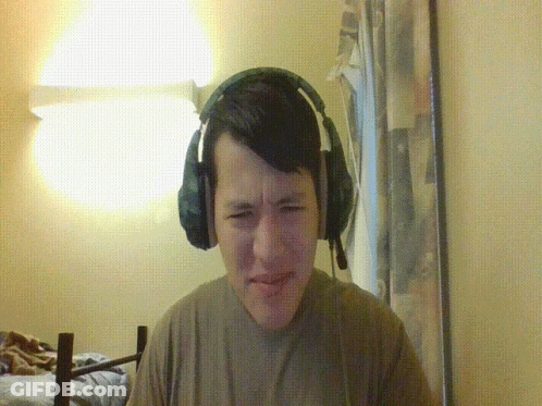 Man With Headphones And Microphone Making Funny Face GIF
