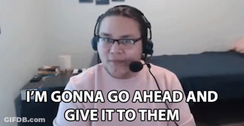 Man With Headphones And Microphone Sitting At Computer GIF