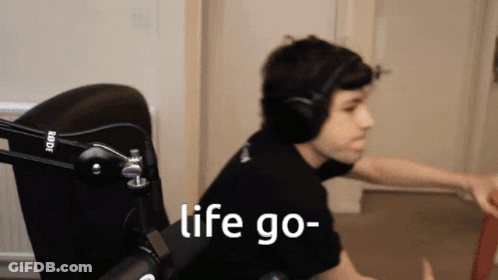 Man With Headphones And Rode Mic Saying Life Go GIF