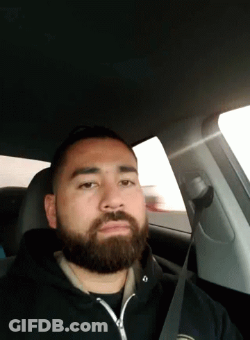 Man With Headphones And Shirt Saying Okay GIF