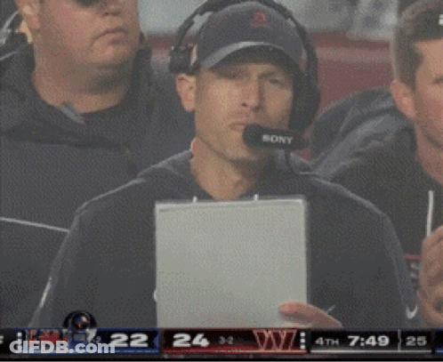 Man With Headphones And Sony Headset Holding Tablet GIF