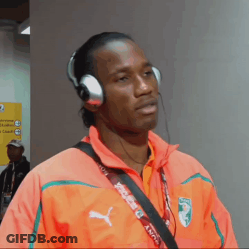 Man With Headphones And Sony Lanyard GIF