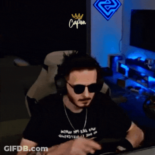 Man With Headphones And Sunglasses In Front Of Capon Sign GIF