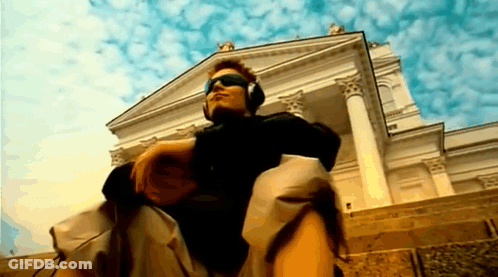 Man With Headphones And Sunglasses On Stairs GIF