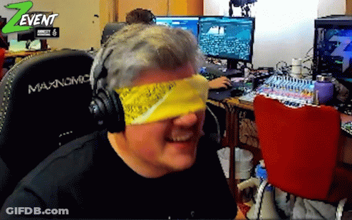 Man With Headphones And Yellow Bandana In Front Of Z Event Logo GIF