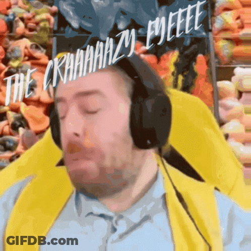 Man With Headphones And Yellow Vest Says Crahhhhzy Eyeeeee GIF