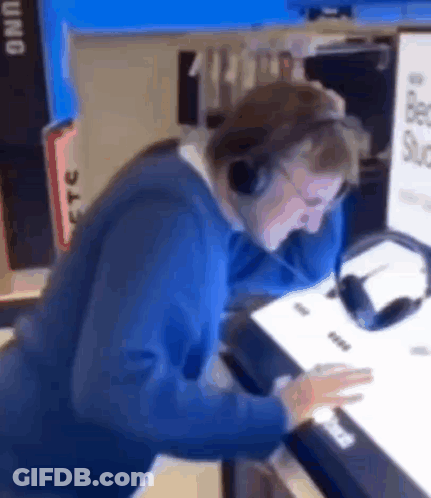 Man With Headphones At Computer GIF