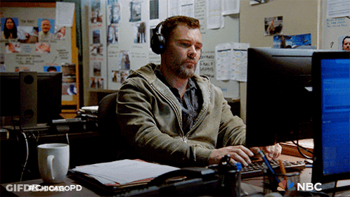 Man With Headphones At Computer #ChicagoPD GIF