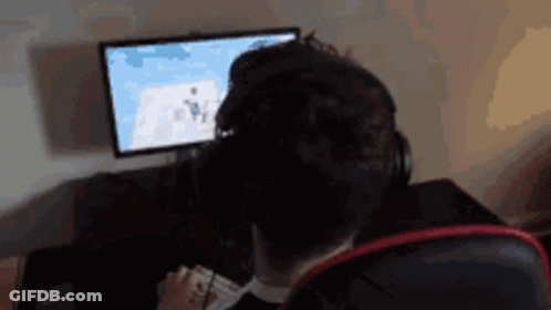 Man With Headphones At Computer GIF