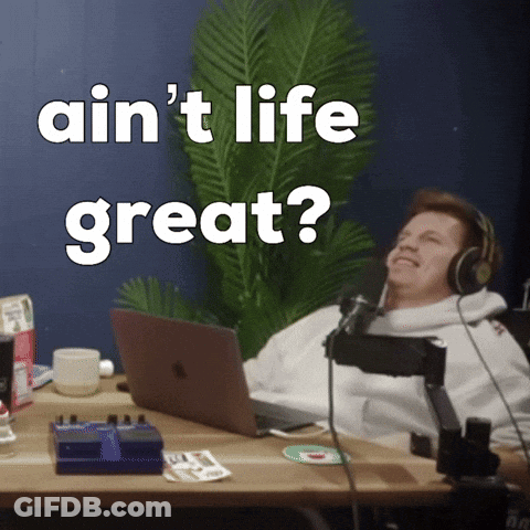 Man With Headphones At Desk Laptop Saying Ain't Life Great GIF