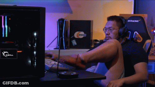 Man With Headphones At G.Skill Computer GIF