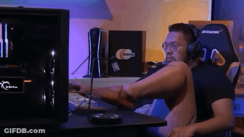 Man With Headphones At GSkill Computer Desk GIF