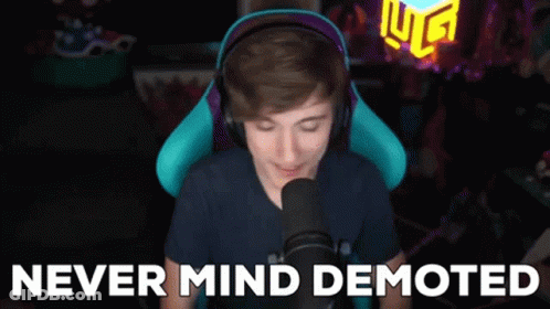 Man With Headphones At Microphone Saying Never Mind Demoted GIF