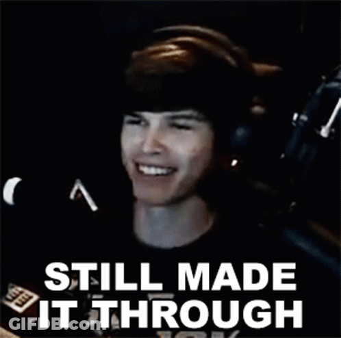 Man With Headphones At Microphone Saying Still Made It Through GIF