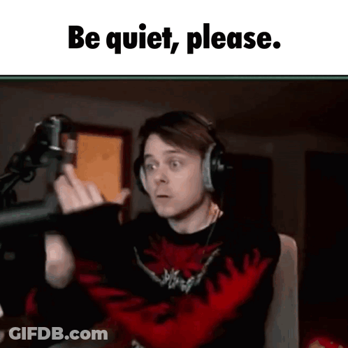 Man With Headphones At Microphone Says Be Quiet Please GIF