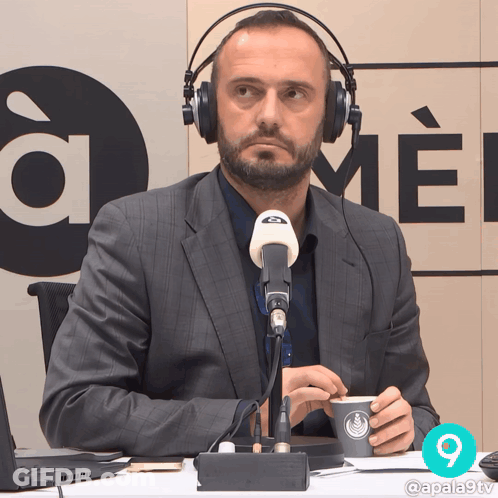 Man With Headphones At Microphone Sign A Me GIF