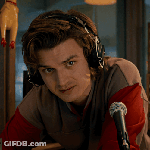 Man With Headphones At Shure Microphone GIF