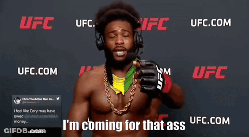 Man With Headphones At UFC Banner GIF
