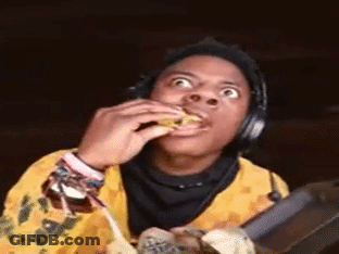 Man With Headphones Eating Banana Making A Face GIF