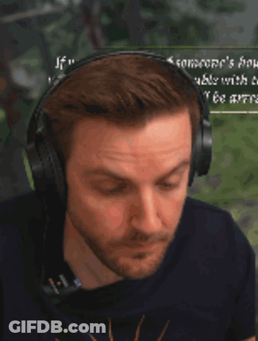 Man With Headphones Eating Hamburger & Saying And Someone's Problem GIF