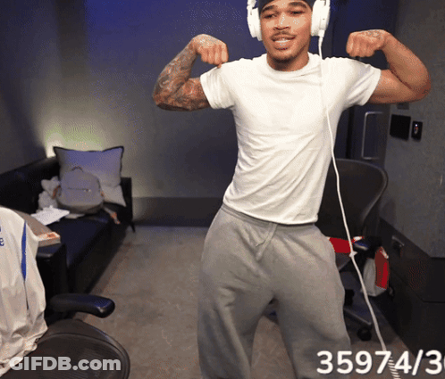 Man With Headphones Flexing 359743 GIF