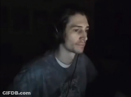 Man With Headphones Funny Face In Dark Room GIF