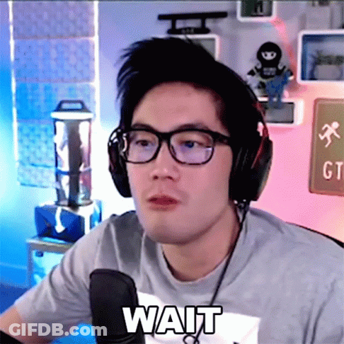 Man With Headphones, Glasses, And Wait Shirt GIF