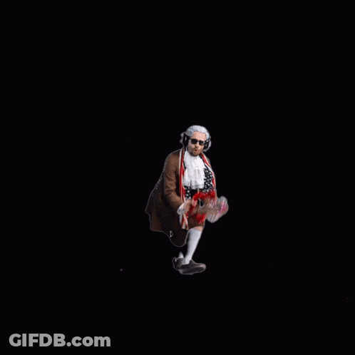 Man With Headphones Holding Heart Wreath Saying Be My Valentine GIF