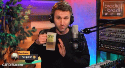 Man With Headphones Holding Mug Saying That Pour GIF