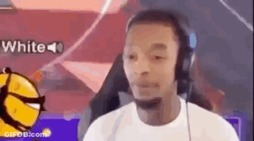 Man With Headphones In Front Of Basketball GIF