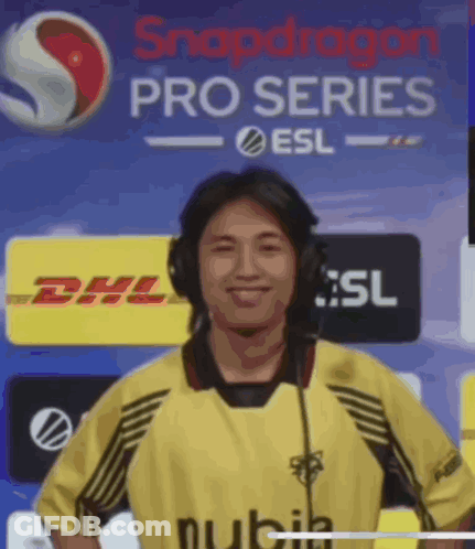 Man With Headphones In Front Of Snapdragon Pro Series Banner GIF