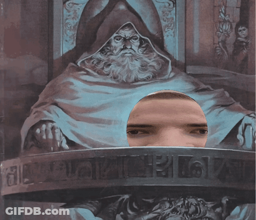 Man With Headphones In Front Of Wizard Painting GIF