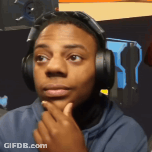 Man With Headphones Looking At Camera GIF