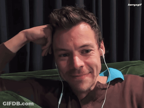 Man With Headphones Looking At Camera With Harryxgif GIF