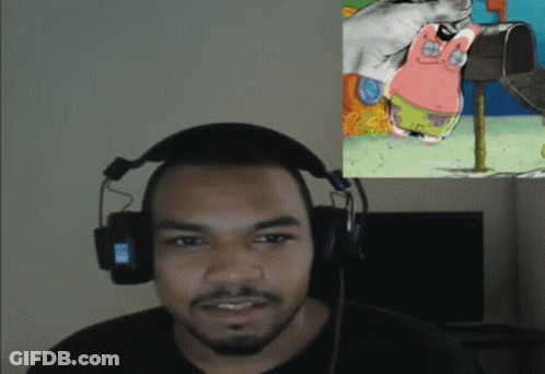 Man With Headphones Looking At Patrick Star GIF