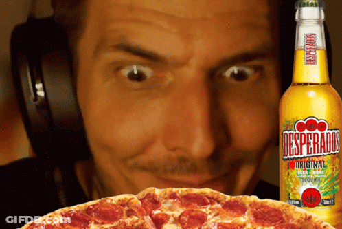Man With Headphones Looking At Pizza And Desperados GIF