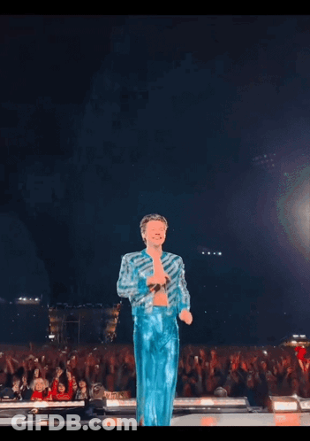 Man With Headphones Looks At Camera Harryxgif GIF