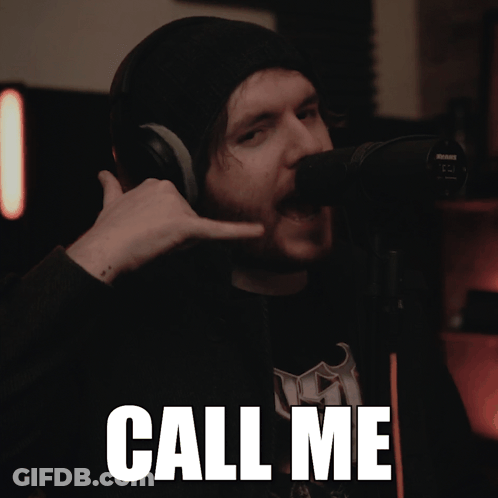 Man With Headphones Making Call Me Sign GIF