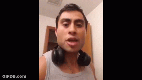 Man With Headphones Making Funny Face GIF