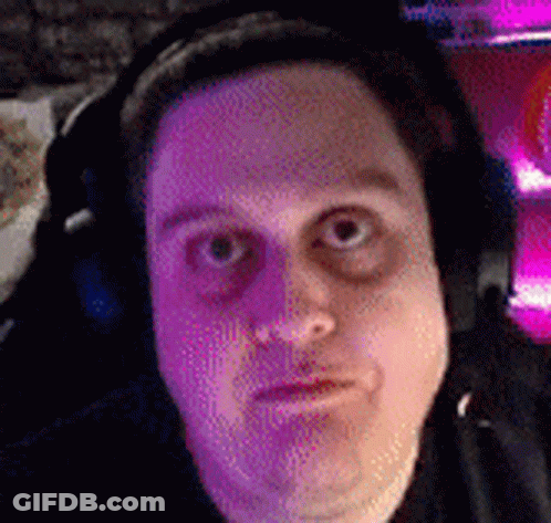 Man With Headphones Making Funny Face In Pink GIF