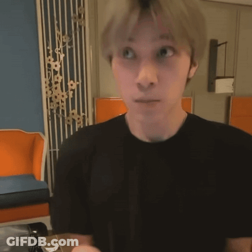 Man With Headphones Making Funny Face Playing Video Game GIF