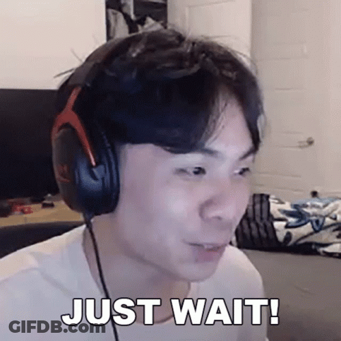 Man With Headphones Making Funny Face Saying Just Wait GIF
