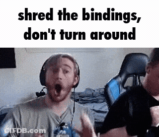 Man With Headphones Making Funny Face To Another Man GIF