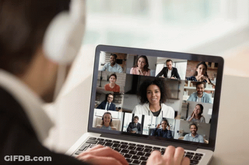 Man With Headphones On Laptop With Group Of People GIF