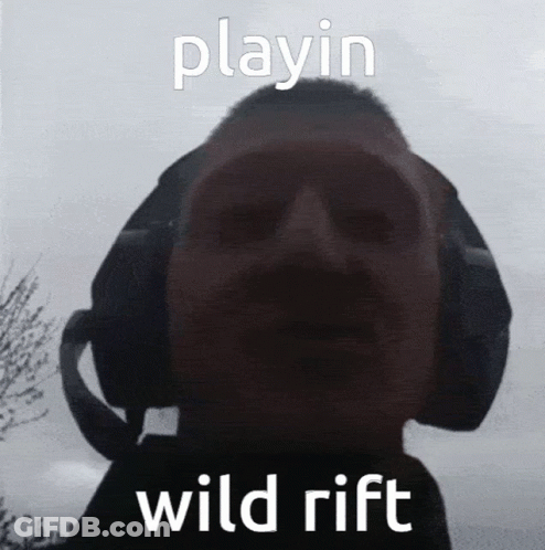 Man With Headphones Playin Wild Rift GIF