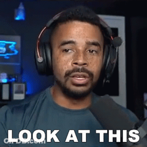 Man With Headphones Saying Look At This GIF