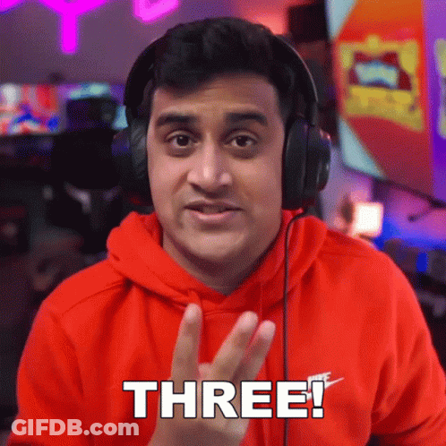 Man With Headphones Saying Three GIF