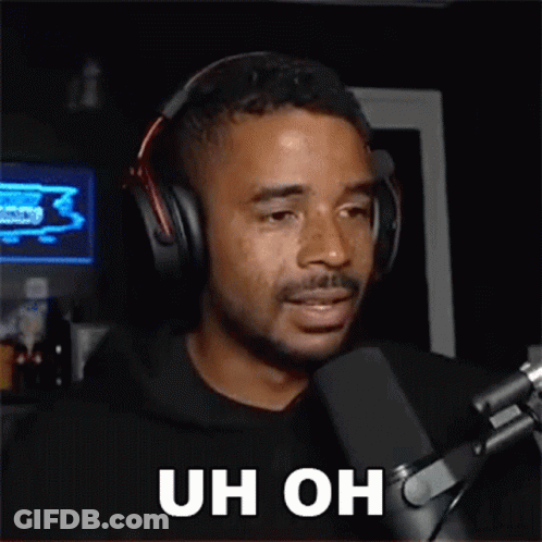 Man With Headphones Saying Uh Oh GIF