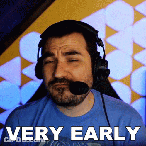 Man With Headphones Saying Very Early GIF