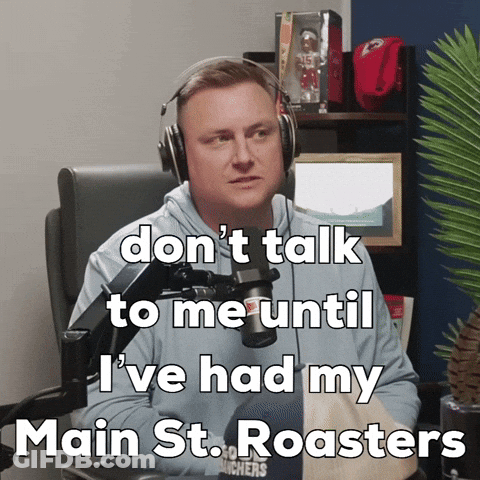 Man With Headphones Says Don't Talk To Me Until I've Had My Main St GIF